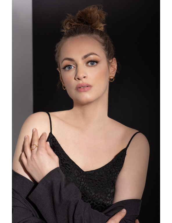 Delicate gold stainless steel hoop earrings on stud closure