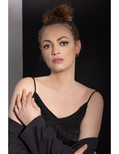 Delicate gold stainless steel hoop earrings on stud closure