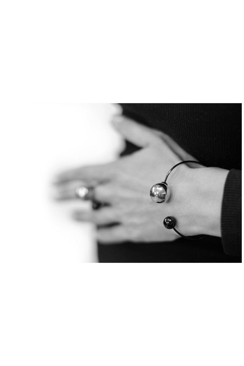 Modern black and gold stainless steel bracelet with spheres