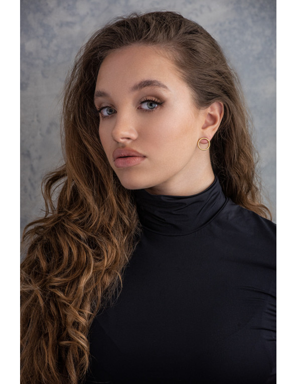 Delicate gold stainless steel hoop earrings on stud closure