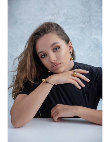 Stainless steel jewelry set with a large golden sphere – ring and earrings in an elegant gift set.