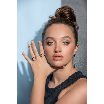 A delicate ring made of matte black stainless steel in a circular form. 2