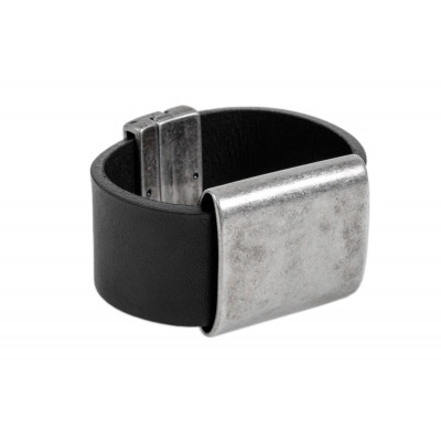 Men’s leather and matte stainless steel bracelet with a magnetic clasp and aged metal finish.
