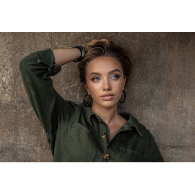 Large black matte stainless steel hoop earrings with a timeless and elegant design. 2