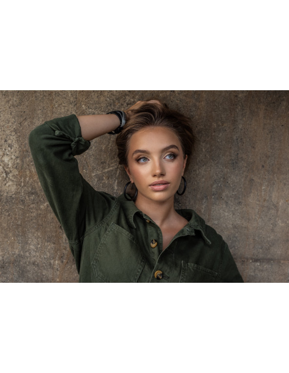 Large black matte stainless steel hoop earrings with a timeless and elegant design.