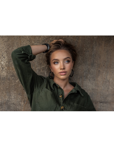 Large black matte stainless steel hoop earrings with a timeless and elegant design.