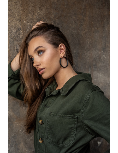 Large black matte stainless steel hoop earrings with a timeless and elegant design.