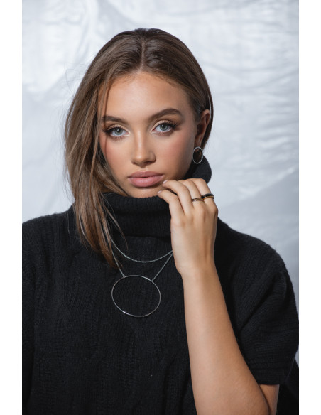 Long Circle stainless steel necklace in steel tone with a modern geometric design.