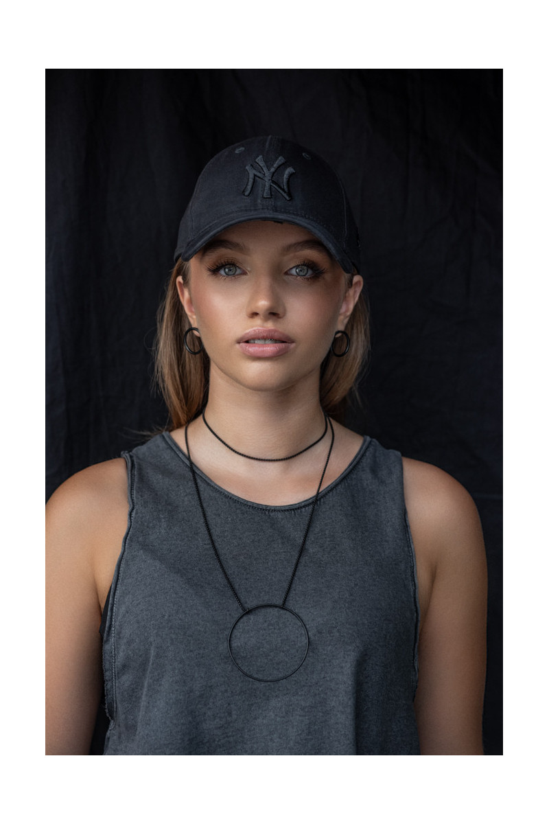 Long Circle necklace made of black matte stainless steel with a geometric design.