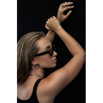 Black matte stainless steel hoop earrings with a stud clasp. 2