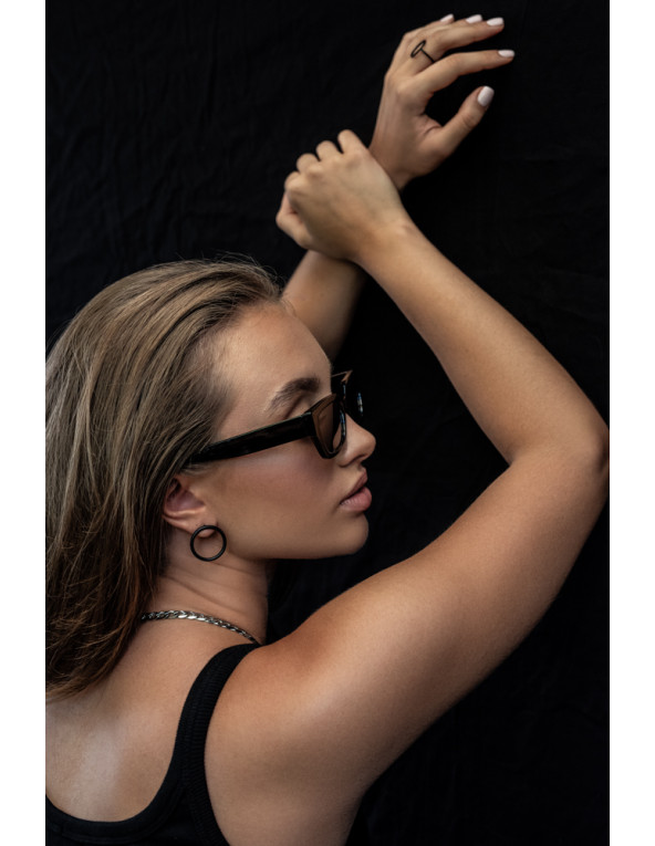 Black matte stainless steel hoop earrings with a stud clasp.