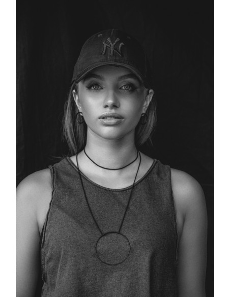 Black matte stainless steel hoop earrings with a stud clasp.