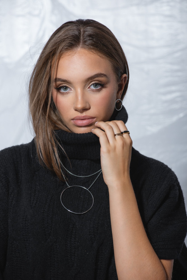 Silver stainless steel hoop earrings with a stud clasp. 2