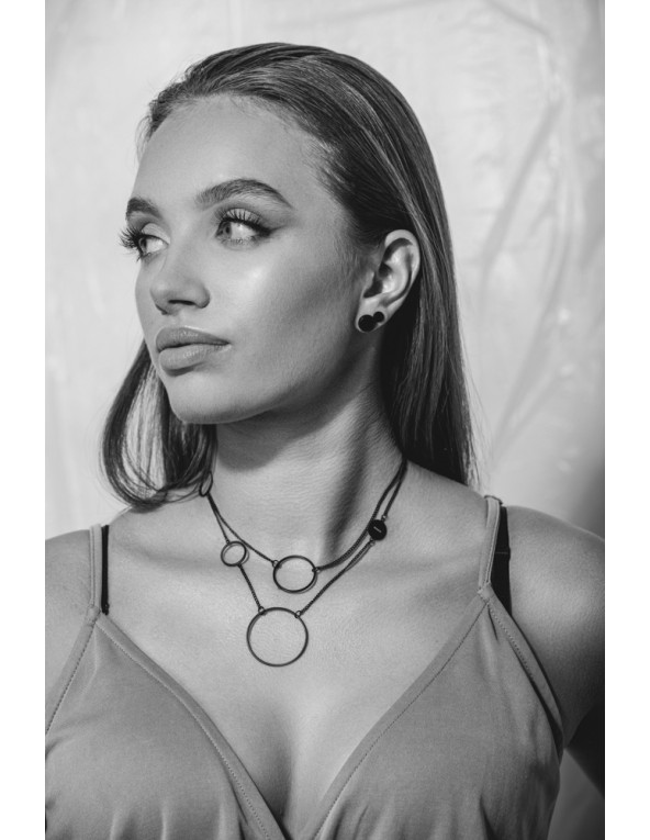 Delicate double Circle necklace made of black matte stainless steel.