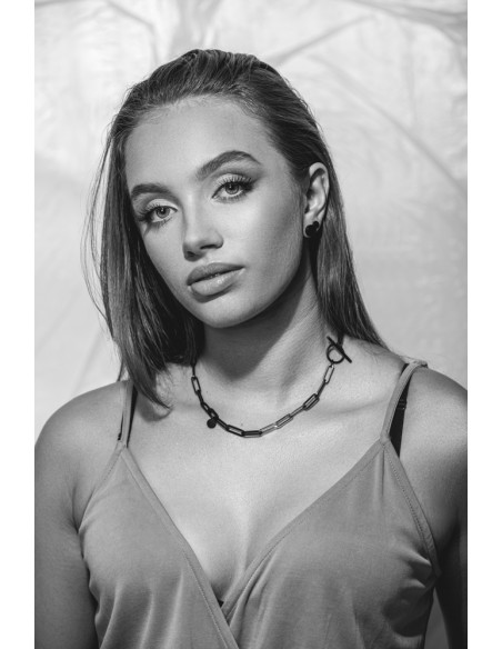 Short black matte stainless steel necklace with large gold-accented links.