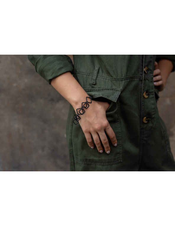 Black matte 3D stainless steel bracelet with a lobster clasp.