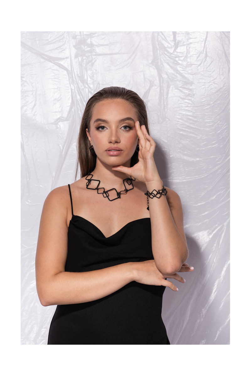 Black matte 3D stainless steel necklace with an elegant lobster clasp.
