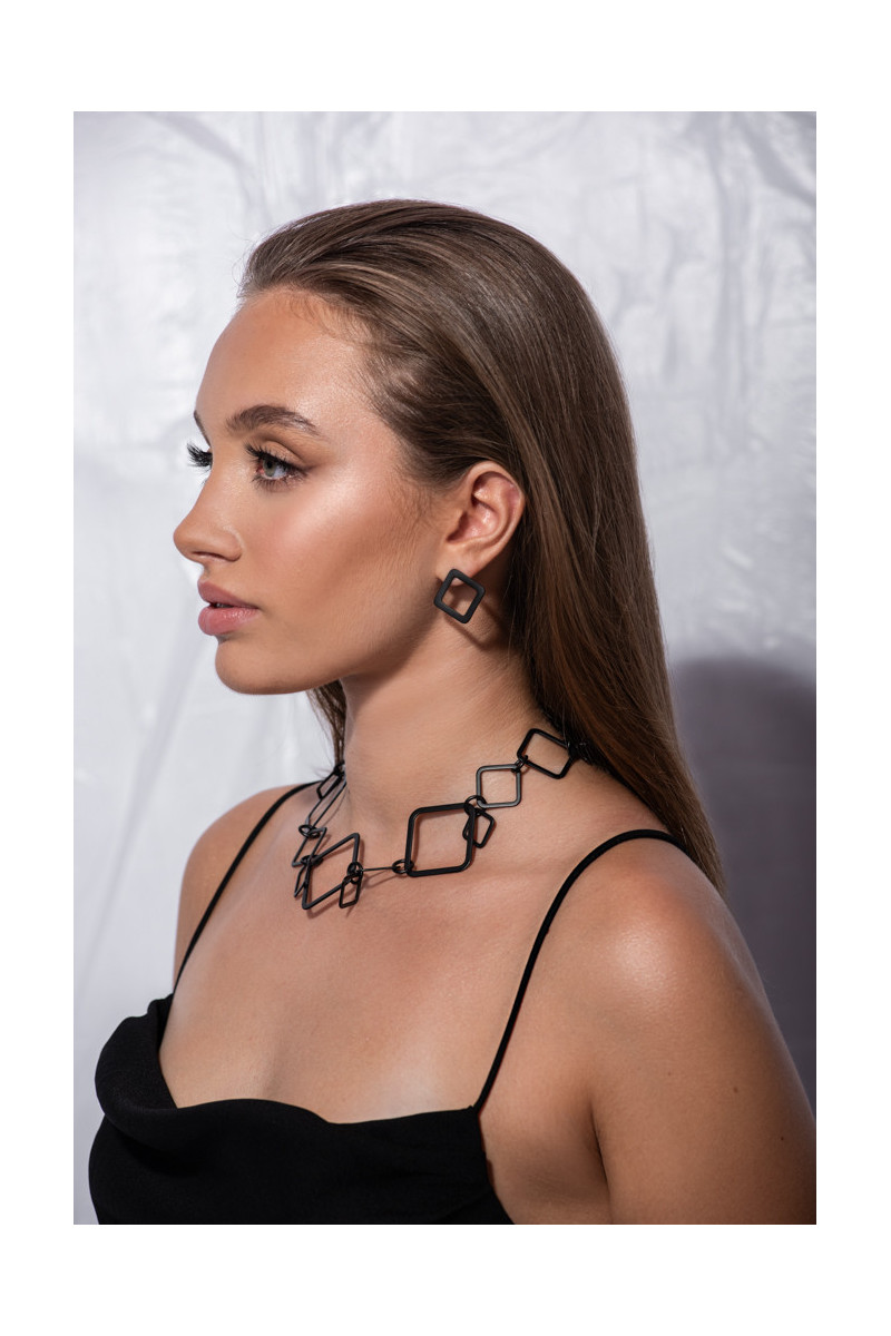 Black matte 3D stainless steel necklace with an elegant lobster clasp.