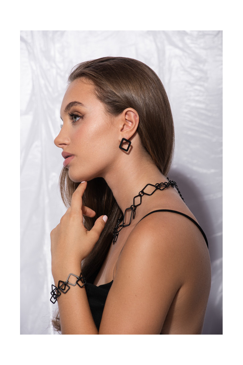 Black matte 3D stainless steel necklace with an elegant lobster clasp.