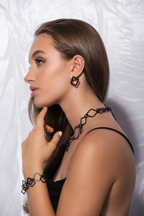 Black matte 3D stainless steel necklace with an elegant lobster clasp.