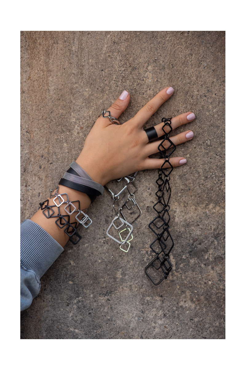 Black matte 3D stainless steel necklace with an elegant lobster clasp.