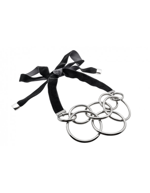 Adjustable stainless steel circles necklace with a black velvet ribbon tied into a bow.