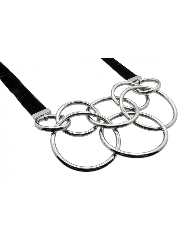 Adjustable stainless steel circles necklace with a black velvet ribbon tied into a bow.