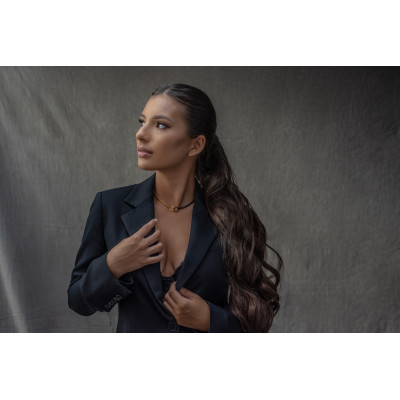 Delicate gold-plated stainless steel necklace in gold and matte black tones. 2