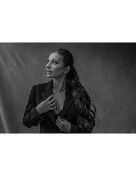 Delicate stainless steel necklace in silver and matte black tones.