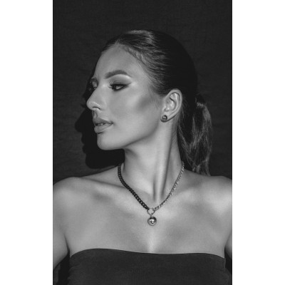 Short adjustable stainless steel necklace with a polished silver sphere. 2