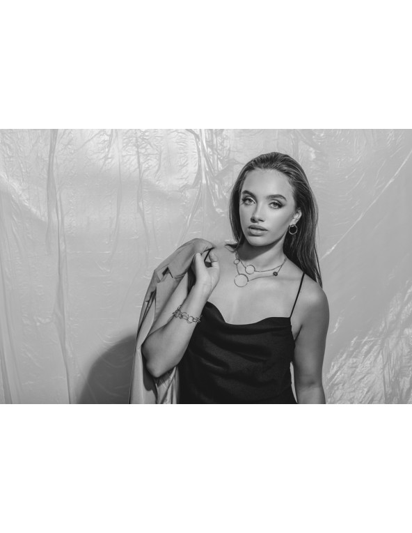 Gold-plated stainless steel bracelet with movable elements in an elegant minimalist style