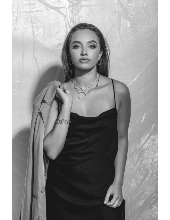 Gold-plated stainless steel bracelet with movable elements in an elegant minimalist style