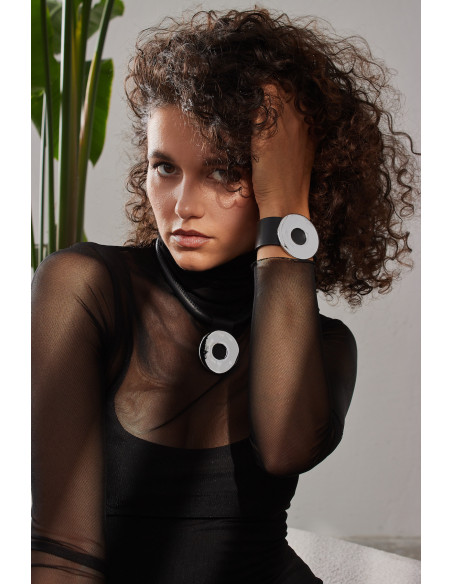 Black leather bracelet with polished circular steel detail