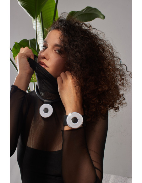 Wide black leather bracelet with polished stainless steel element