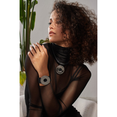 Black leather bracelet with matte steel circle in a wide, geometric design 2