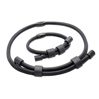 Adjustable necklace and bracelet set made of natural leather and matte black stainless steel.
