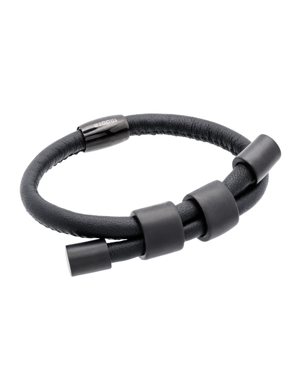 Adjustable necklace and bracelet set made of natural leather and matte black stainless steel.