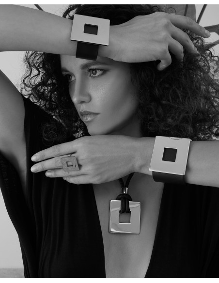 Leather necklace with gold-plated square pendant by Moora.