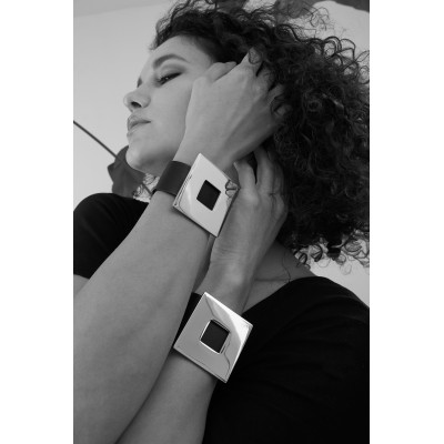 Black women's leather bracelet with a gold-plated square accent and a magnetic gold clasp 2