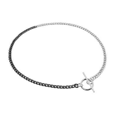 Delicate stainless steel necklace in steel and matte black shades with a decorative clasp.
