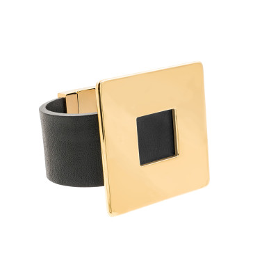 Black women's leather bracelet with a gold-plated square accent and a magnetic gold clasp