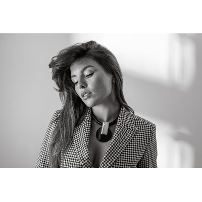 Genuine leather necklace with decorative gold-plated pendant and glossy black steel accents. 2