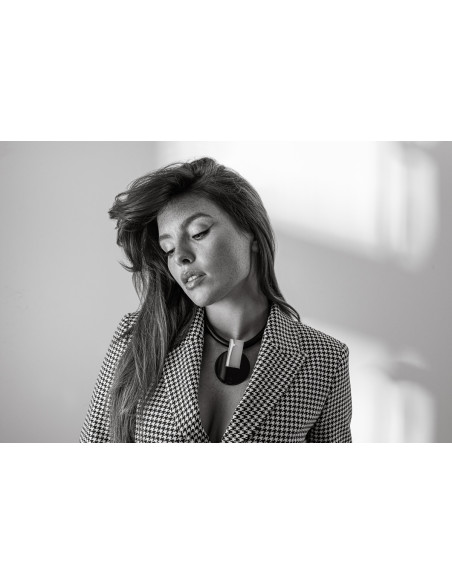 Genuine leather necklace with decorative gold-plated pendant and glossy black steel accents.