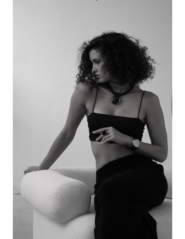 Leather choker with gold-plated stainless steel and glossy sphere in a modern, elegant design.