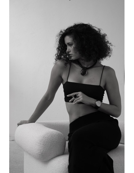 Leather choker with gold-plated stainless steel and glossy sphere in a modern, elegant design.