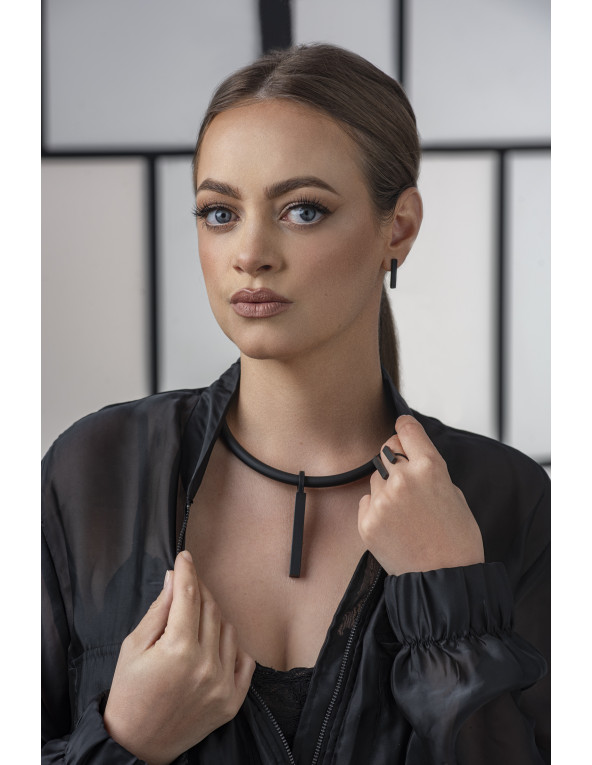 Black rubber necklace with rectangular matte black stainless steel accent.