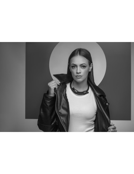 Adjustable black leather choker necklace with matte black stainless steel accent.