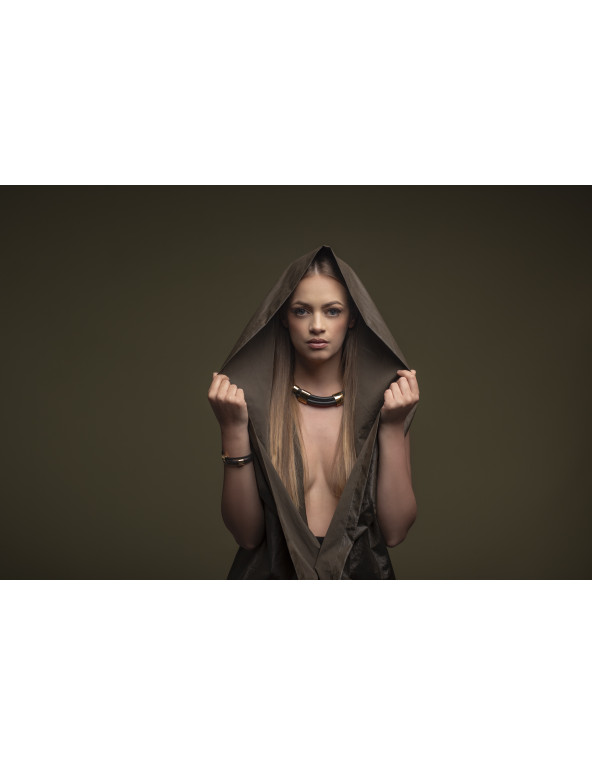 Adjustable black leather choker necklace with glossy gold stainless steel accent.