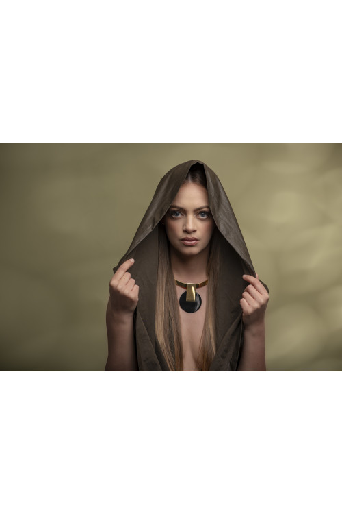 Gold-plated stainless steel choker with decorative pendant in a modern, minimalist style.