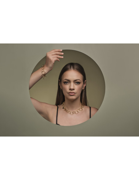 Gold-plated stainless steel bracelet with movable elements in an elegant minimalist style